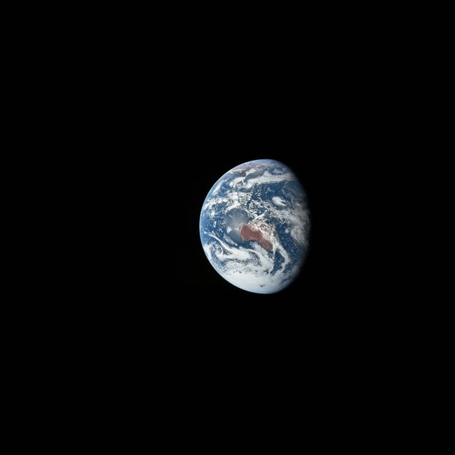 AS17-148-22742 (7-19 Dec. 1972) --- Most of Australia (center) and part of Antarctica are visible in this photo of a three-quarters Earth, recorded with a 70mm handheld Hasselblad camera using a 250mm lens. The three astronauts aboard the Command and Service Modules (CSM) were in the trans-lunar coast phase of the journey when one of them snapped this shot. While astronauts Eugene A. Cernan commander, and Harrison H. Schmitt, lunar module pilot, descended in the Lunar Module (LM) "Challenger" to explore the Taurus-Littrow region of the moon, astronaut Ronald E. Evans, command module pilot, remained with the CSM "America" in lunar orbit.