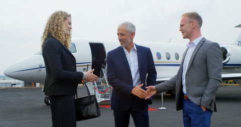 Executives Greeting Near Private Jet at Airport - Download Free Stock Images Pikwizard.com