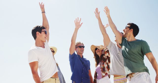 Group of Friends Enjoying Beach Vacation Celebrating and Raising Hands - Download Free Stock Images Pikwizard.com