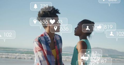 Black mother and daughter connecting on beach with social media notifications overlay