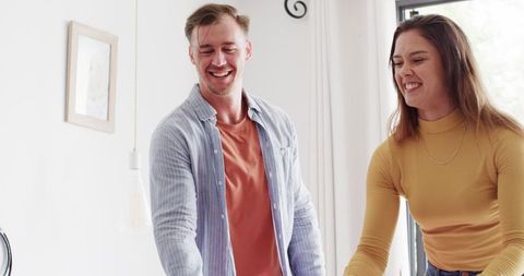 Happy Family Preparing for Vacation at Home
