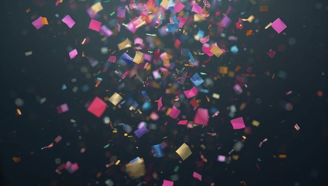 Colorful Confetti Explosion on Dark Background