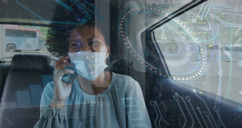 Business Professional Analyzing Data on Phone During Commute