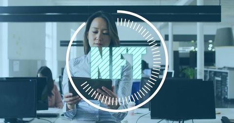 Woman Engaging with NFT Technology in Modern Workspace