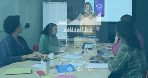 Diverse Team Discussing Data in Modern Meeting with Digital Charts