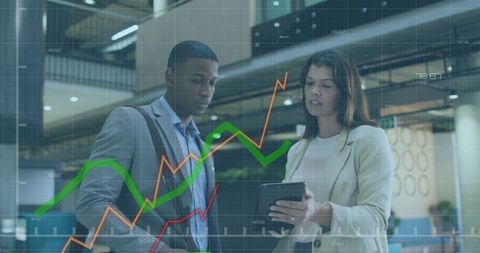 Business Professionals Analyzing Market Data on Tablet - Download Free Stock Images Pikwizard.com