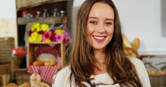 Smiling Baker in Front of Bakery Display - Download Free Stock Images Pikwizard.com