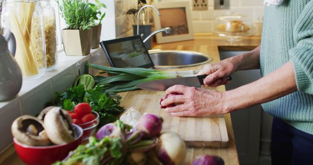 Senior Woman Preparing Vegetables at Home Kitchen - Download Free Stock Images Pikwizard.com