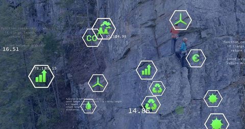 Two climbers ascending rugged rock face with eco data overlays for adventure tech