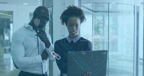 Diverse Business Team Reviewing Cybersecurity Data