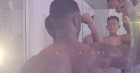 african american father and son bonding in bathroom mirror - Download Free Stock Images Pikwizard.com