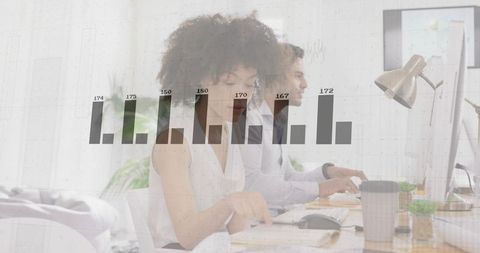 Colleagues Analyzing Data with Overlay Bar Chart in Office