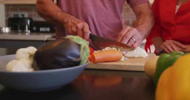 Senior Man Chopping Vegetables in Kitchen for Healthy Meal Preparation - Download Free Stock Images Pikwizard.com