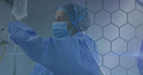 Nurse Adjusting IV Bag in Sterile Hospital Environment