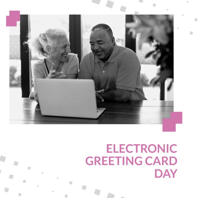 The image shows a joyful elderly couple of different ethnic backgrounds using a laptop. The scene highlights Electronics Greeting Card Day, emphasizing the ease and joy technology brings to their lives. Perfect for topics related to senior technology adoption, celebrating special days digitally, and the importance of keeping elderly people connected through tech.