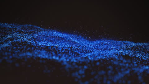 Dynamic Blue Particles Over Black Abstract Background