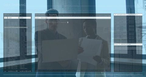 Business professionals reviewing laptop and documents with cybersecurity data overlays