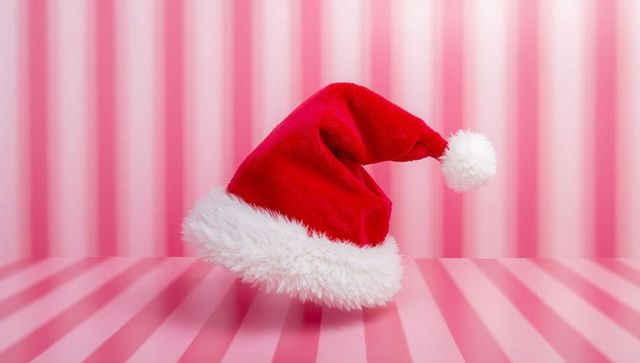 Floating Santa Hat on Pink Stripes Red Velvet Christmas Cap with White Faux-Fur Pom Pom