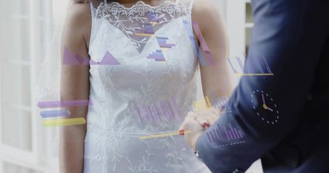Groom placing ring on bride's hand, lace gown with augmented reality overlays, intimate vows