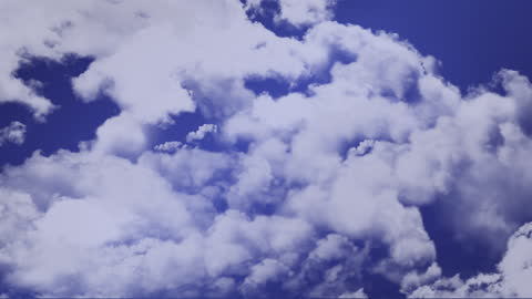 Timelapse of Fluffy White Clouds in Blue Sky