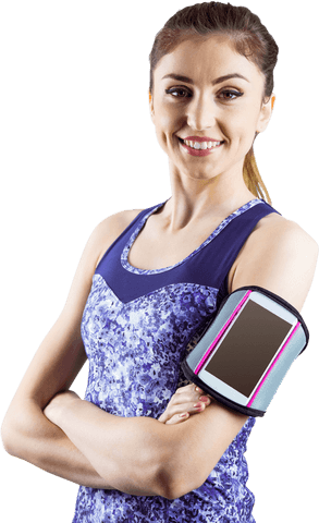 Smiling woman with smartphone in transparent armband