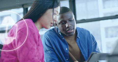 Diverse Professionals in Office Analyzing Financial Data