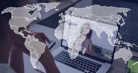 Remote team connecting via video conference with world map overlay on laptop screen