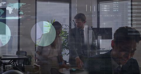 Business Professionals Analyzing Data Driven Insights In Office