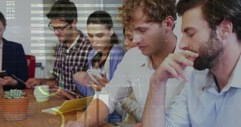 Diverse team analyzing financial data with digital projection