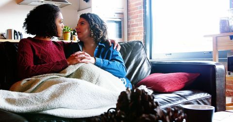 Loving Lesbian Couple Relaxing at Home
