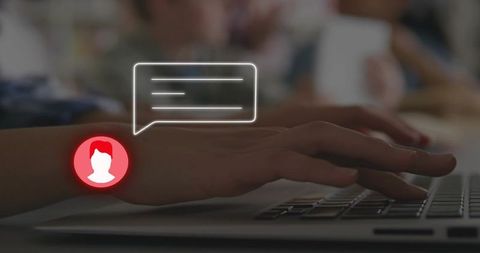 Hands typing on laptop with chat bubble and red user avatar for remote messaging