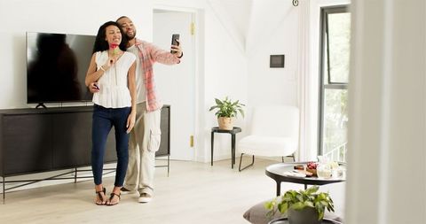 Engaged Couple Celebrating Love at Home