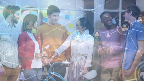 Animated Network Connections Over Energetic Team Meeting in Modern Office