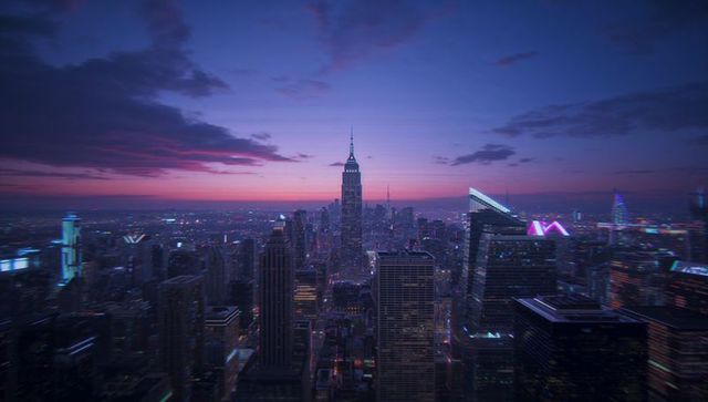 Empire state building shining amidst dusk in neon glow