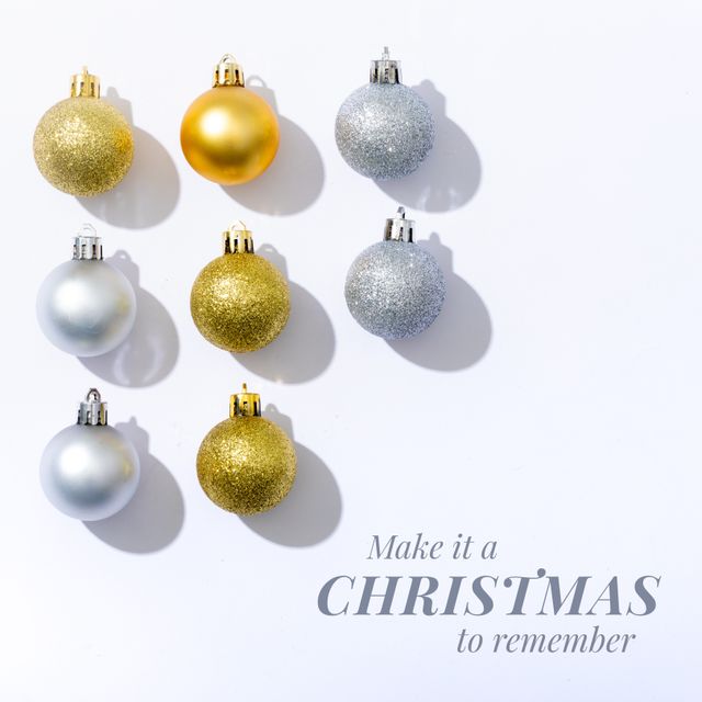 Composition of merry christmas text over christmas baubles. Christmas and celebration concept digitally generated image.