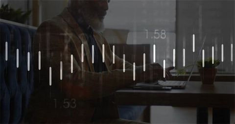Mature professional typing on laptop in cafe with financial candlestick chart overlay