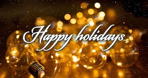 Festive Happy Holidays Over Glowing Bulb Decoration