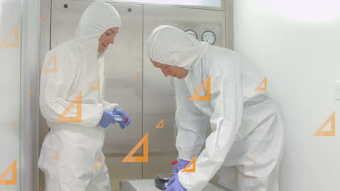 Lab Technicians in Safety Gear Conducting Procedures in Elevator
