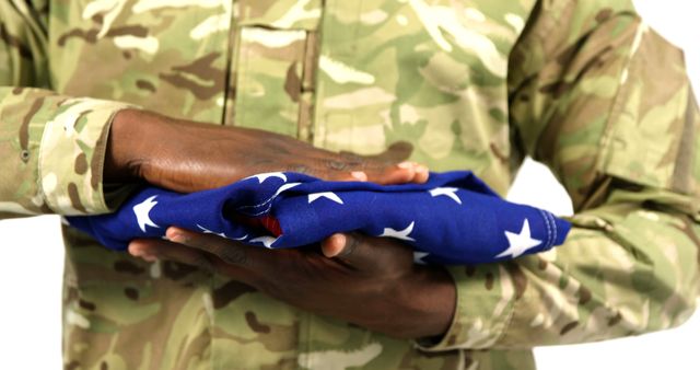 Soldier Holding Folded American Flag on White Background - Download Free Stock Images Pikwizard.com