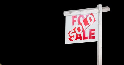 Sold House Sign with Gold Confetti Falling