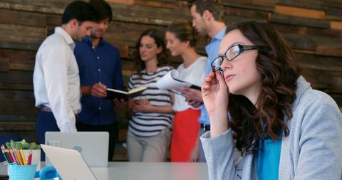 Businesswoman Contemplating in Modern Office Setting - Download Free Stock Images Pikwizard.com