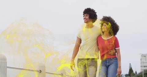 Romantic Couple Strolling by Waterfront Amid Energetic Sparkle