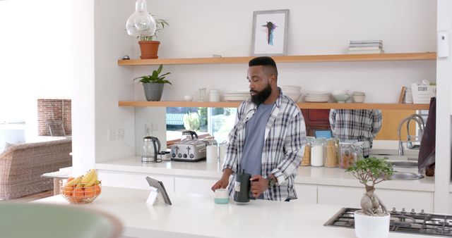 Man Preparing Morning Coffee in Modern Kitchen - Download Free Stock Images Pikwizard.com