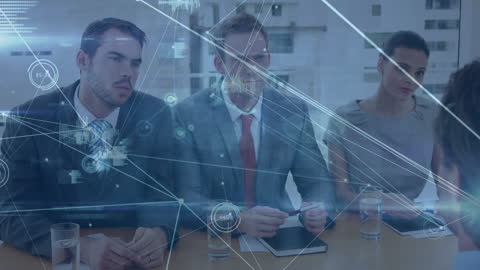 Caucasian Business Meeting with Advanced Technology Display