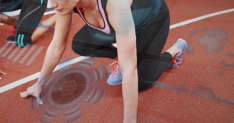 Athlete Preparing in Starting Position on Digital Overlay Athletics Track