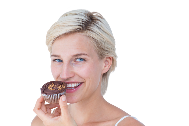 Woman enjoying chocolate muffin with smiles on transparent background - Download Free Stock Videos Pikwizard.com