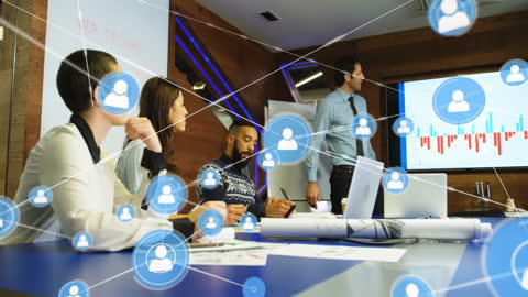 Business Team in Meeting with Digital Network Concept Overlay