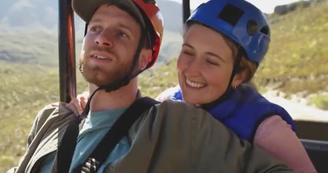 Couple enjoying laid-back moment outdoors in mountains. Ideal for illustrating adventure travel, outdoor recreation, and romantic vacations. Perfect for use in travel brochures, adventure activity promotions, and tourism websites highlighting the joy of experiencing nature-based activities together.