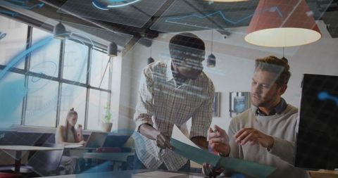 Diverse Team Collaboration in Modern Open-Plan Office with Digital Interactions