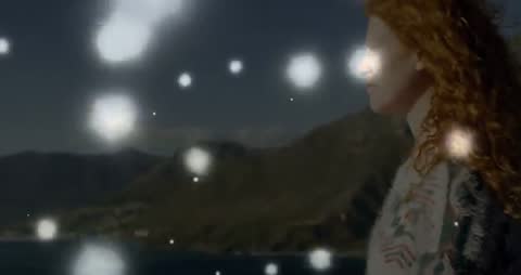 Woman Staring at Star-Lit Beach with Glowing Orbs in Ambience